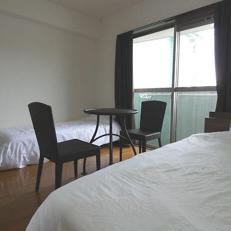 Ao Dazaifu Aparthotel Chikushino Bagian luar foto