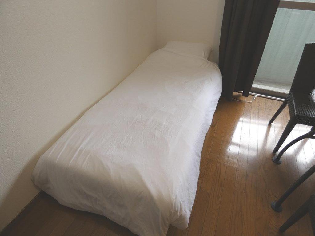 Ao Dazaifu Aparthotel Chikushino Bagian luar foto