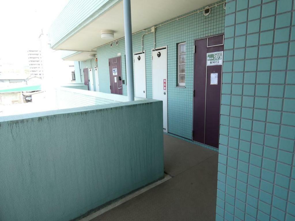 Ao Dazaifu Aparthotel Chikushino Bagian luar foto