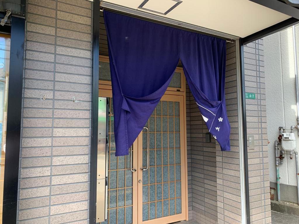 Ao Dazaifu Aparthotel Chikushino Bagian luar foto