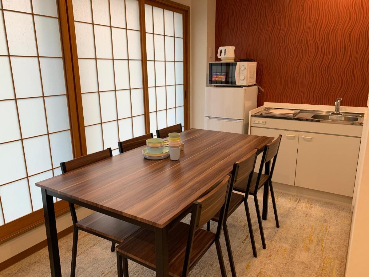 Ao Dazaifu Aparthotel Chikushino Bagian luar foto