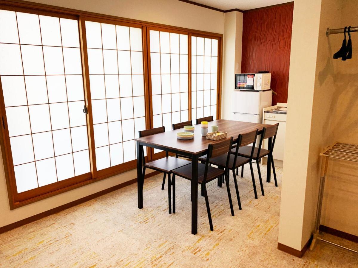 Ao Dazaifu Aparthotel Chikushino Bagian luar foto