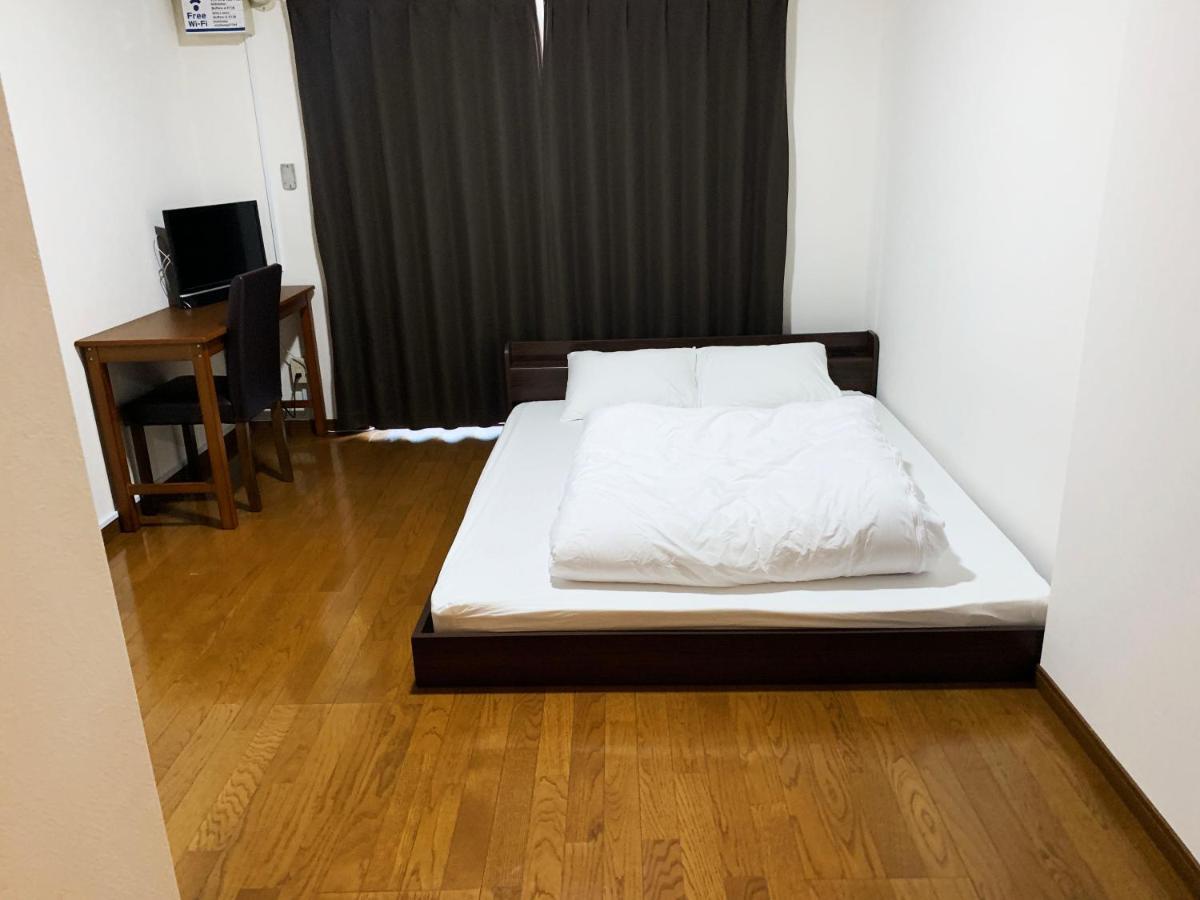 Ao Dazaifu Aparthotel Chikushino Bagian luar foto