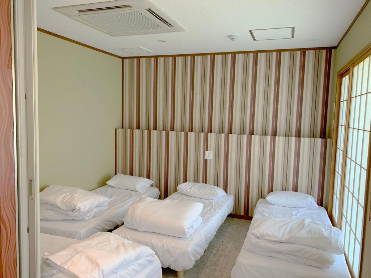 Ao Dazaifu Aparthotel Chikushino Bagian luar foto