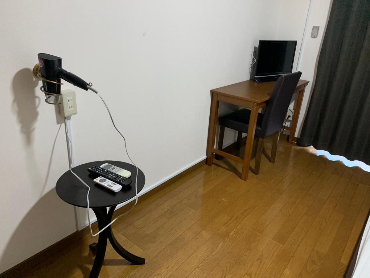 Ao Dazaifu Aparthotel Chikushino Bagian luar foto