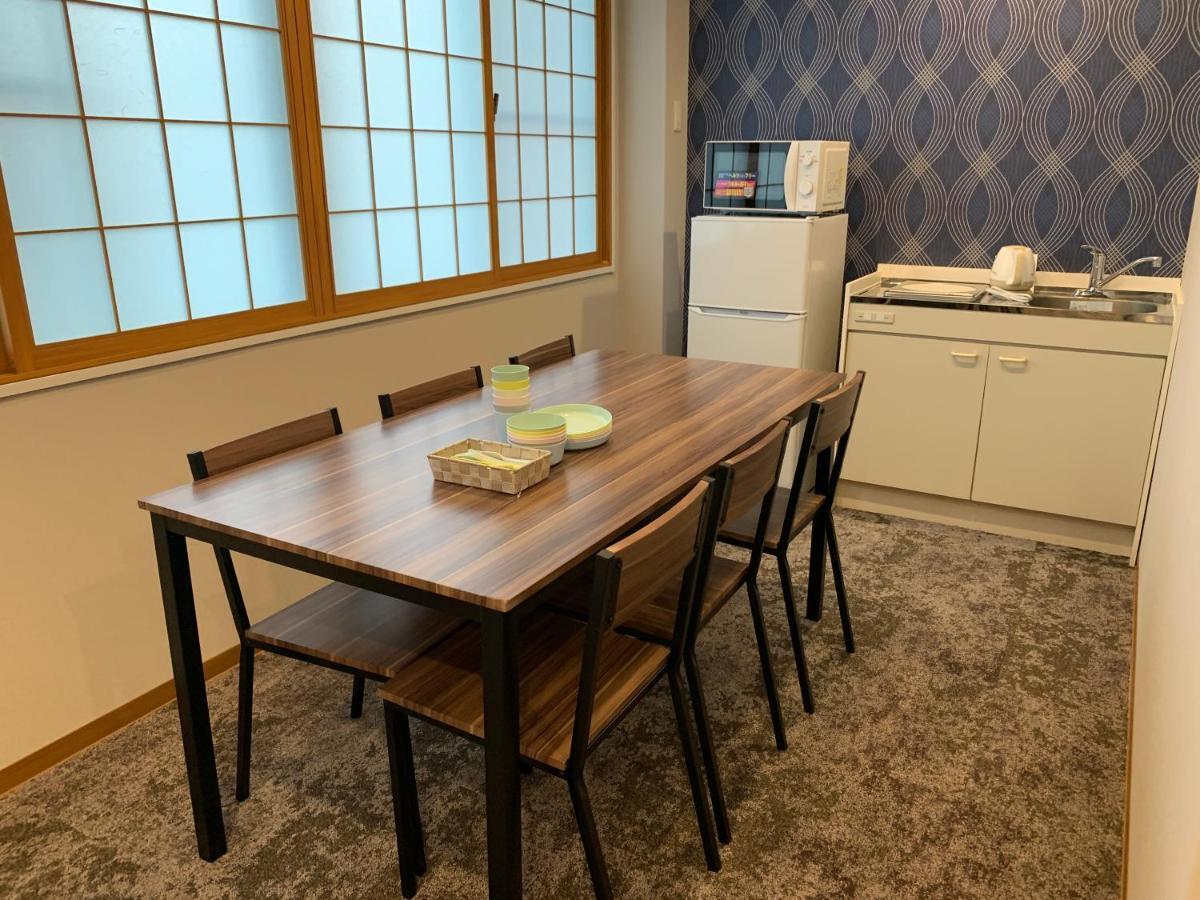 Ao Dazaifu Aparthotel Chikushino Bagian luar foto