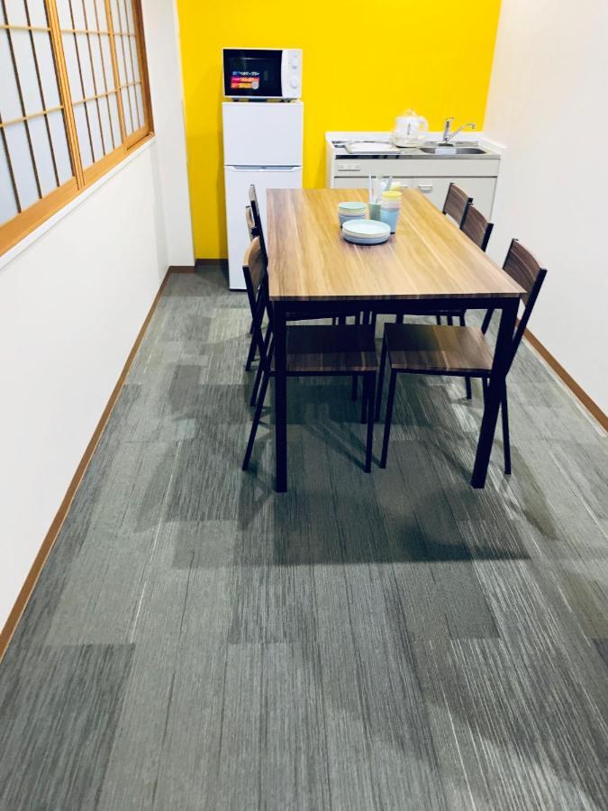 Ao Dazaifu Aparthotel Chikushino Bagian luar foto