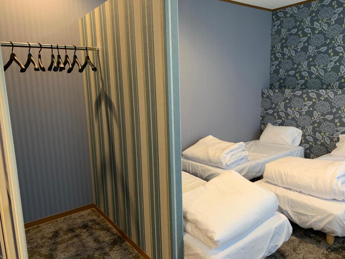 Ao Dazaifu Aparthotel Chikushino Bagian luar foto
