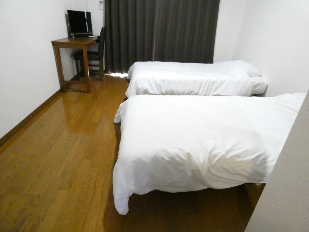 Ao Dazaifu Aparthotel Chikushino Bagian luar foto